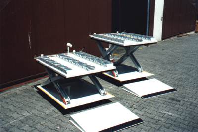 Mesa elevadora con triple via de rodillos